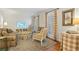 Cozy living room with natural light, hardwood floors, and tasteful furniture arrangement at 2947 Margaret Mitchell Nw Ct, Atlanta, GA 30327