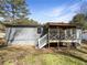 Backyard featuring a screened-in back porch at 3668 Bunker Hill Sw Dr, Atlanta, GA 30331