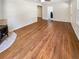 This living room features hardwood floors, fireplace and a ceiling fan at 3668 Bunker Hill Sw Dr, Atlanta, GA 30331