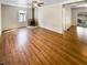Spacious living room featuring gleaming hardwood floors and a cozy fireplace at 3668 Bunker Hill Sw Dr, Atlanta, GA 30331