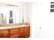 Elegant bathroom features a double sink vanity with granite countertop and stylish fixtures at 55 Bonds Ct, Hiram, GA 30141