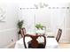 Dining room with formal table and chairs, and decoratively draped window treatments at 55 Bonds Ct, Hiram, GA 30141