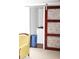 Laundry closet behind decorative sliding door, adjacent to sitting area at 55 Bonds Ct, Hiram, GA 30141
