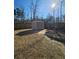 Spacious backyard with shed, privacy fence and wooded perimeter at 1001 Brading Pl, Lawrenceville, GA 30043