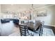 Open-concept living space with kitchen, dining, and living area at 10035 River Rock Dr, Roswell, GA 30076