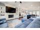 Open floor plan showcasing the living room, kitchen, and dining area at 10035 River Rock Dr, Roswell, GA 30076