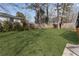 Lush backyard with a large, well-maintained lawn and mature trees at 1784 Terry Mill Se Rd, Atlanta, GA 30316