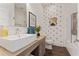 Modern bathroom with white subway tile, a square sink, and stylish black and white striped wallpaper at 1784 Terry Mill Se Rd, Atlanta, GA 30316