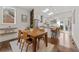 Bright dining room featuring a skylight and an open view to the kitchen at 1784 Terry Mill Se Rd, Atlanta, GA 30316