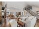 Bright, open living room with high ceilings, hardwood floors, modern fireplace, and metal staircase at 1784 Terry Mill Se Rd, Atlanta, GA 30316