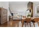 Open living room featuring a stone fireplace, high ceilings, and a sliding barn door at 1784 Terry Mill Se Rd, Atlanta, GA 30316