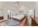 Spacious main bedroom featuring an ensuite bathroom and sitting room with a large colorful rug at 1784 Terry Mill Se Rd, Atlanta, GA 30316