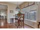 Cozy breakfast nook featuring a bar-height table and large windows for natural lighting at 480 Firelite Ln, Suwanee, GA 30024
