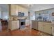 Stainless steel appliances complement the granite countertops in this kitchen with hardwood floors at 480 Firelite Ln, Suwanee, GA 30024
