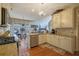 Bright kitchen with granite countertops, stainless steel appliances, and modern lighting at 480 Firelite Ln, Suwanee, GA 30024