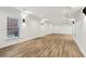 Large, open finished basement with recessed lighting and plank flooring at 5960 Magnolia Rdg, Stone Mountain, GA 30087