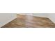 Close-up of light wood floors with white baseboards at 5960 Magnolia Rdg, Stone Mountain, GA 30087