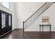 Grand foyer with hardwood floors, decorative door, and staircase at 5960 Magnolia Rdg, Stone Mountain, GA 30087