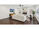 Modern living room with a sleek fireplace, hardwood floors, and stylish decor that offers a cozy atmosphere at 5960 Magnolia Rdg, Stone Mountain, GA 30087