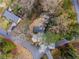 Aerial view of the house situated on a corner lot with mature trees and landscaping at 1210 Beech St, Marietta, GA 30062