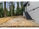 Paver patio and stairs leading to the back entry of the home, with access to the yard at 1210 Beech St, Marietta, GA 30062