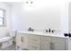 Modern bathroom with double vanity sinks and a neutral color scheme at 1210 Beech St, Marietta, GA 30062