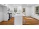 Modern kitchen with white cabinetry, subway tile backsplash, and stainless appliances at 1210 Beech St, Marietta, GA 30062
