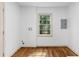 Bright room with wood floors and a window offering natural light at 1210 Beech St, Marietta, GA 30062