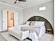 Comfortable bedroom with a plush bed, a full headboard, and natural light at 66 Rogers Ne St, Atlanta, GA 30317