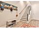 Stylish entryway with stairs and shoe rack at 66 Rogers Ne St, Atlanta, GA 30317