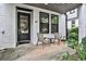 Charming front porch with seating area and inviting entrance at 66 Rogers Ne St, Atlanta, GA 30317