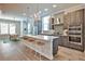 Spacious kitchen with island seating and stainless steel appliances at 66 Rogers Ne St, Atlanta, GA 30317