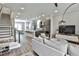 Bright living room featuring hardwood floors, modern decor, and an open floor plan at 66 Rogers Ne St, Atlanta, GA 30317