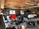 Spacious garage with cluttered workspace, ample storage, and various tools at 217 Shields Rd, Stockbridge, GA 30281