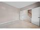 Bedroom with natural light and a view into the stairway at 61 Okeechobee Way, Braselton, GA 30548
