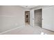 Bedroom with a sliding door closet and view to full bathroom at 61 Okeechobee Way, Braselton, GA 30548