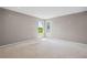 A sunny bedroom with dual windows providing abundant natural light at 61 Okeechobee Way, Braselton, GA 30548