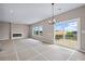 Living room features a sliding door leading to a deck with scenic views at 61 Okeechobee Way, Braselton, GA 30548