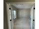 A bright office space with a large window and double doors for added privacy at 61 Okeechobee Way, Braselton, GA 30548
