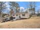 Charming home with a well-maintained yard and inviting entryway at 6355 Queens Rd, Douglasville, GA 30135