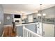 Living room featuring a fireplace, stylish decor, and access to the front entrance at 6355 Queens Rd, Douglasville, GA 30135