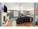 Comfortable living room with a fireplace, ceiling fan and modern furnishings at 6355 Queens Rd, Douglasville, GA 30135