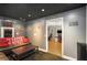 Media room with Coca-Cola signage that leads to a game room at 6355 Queens Rd, Douglasville, GA 30135