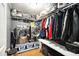 Walk-in closet contains a laundry area and plenty of storage space at 6355 Queens Rd, Douglasville, GA 30135