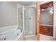 Bathroom featuring a soaking tub and separate shower at 123 Luckie Nw St # 2510, Atlanta, GA 30303