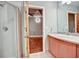 Modern bathroom featuring a glass-enclosed shower, and a granite countertop with a sink basin at 123 Luckie Nw St # 2510, Atlanta, GA 30303