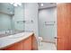 Bathroom with large mirror, vanity, and separate toilet at 123 Luckie Nw St # 2510, Atlanta, GA 30303