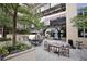 Beautiful courtyard offers outdoor seating and lush greenery, creating a perfect community gathering space at 123 Luckie Nw St # 2510, Atlanta, GA 30303
