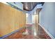 Hallway features a concrete ceiling, stained concrete floors and a sliding wood door on a metal track at 123 Luckie Nw St # 2510, Atlanta, GA 30303