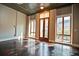 Bright living room featuring stained concrete floors, exposed ceiling and large windows with city views at 123 Luckie Nw St # 2510, Atlanta, GA 30303